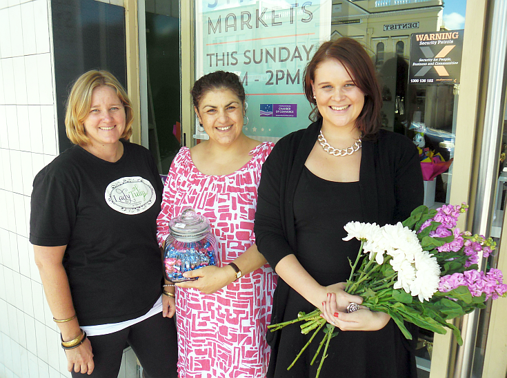 Christine Coorey (Centre) with Jodi (l) and Danica (r) from Lady Tulip which will open during the markets for flower arrangements and old fashioned sweets