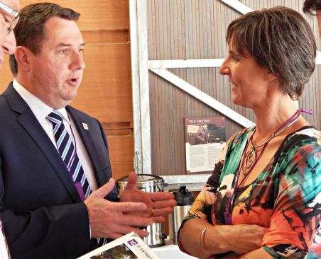 Minister Andrew Powell chatting with Stephanie Keays