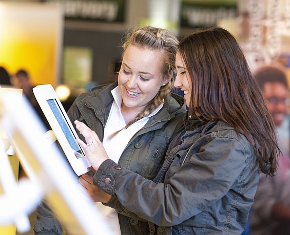 Charlotte Whitley (left) and Mikaela McInnes find out about university life at USQ Open Day 2014