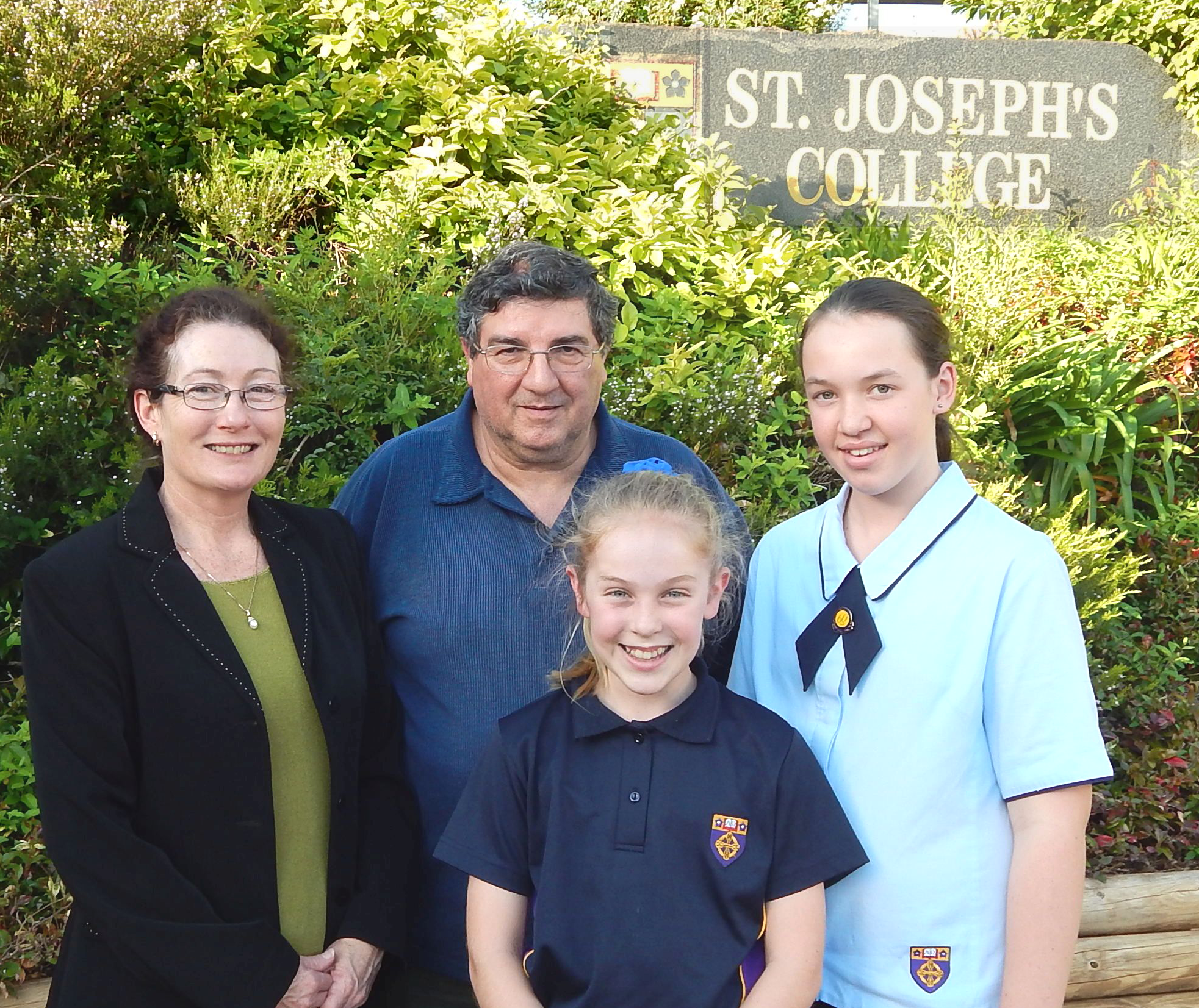 Teachers Madel;eine Minns and Gerard Saide with Courtney Dukes andAbbey-Rose Condon